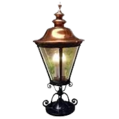 Elegant electrical lighting: A vintage-style lantern with a copper top and ornate black iron base providing a warm glow, Seattle, WA.